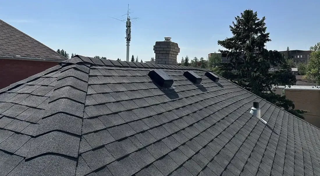 Asphalt shingle roof with hips, ridges and roof penetrations
